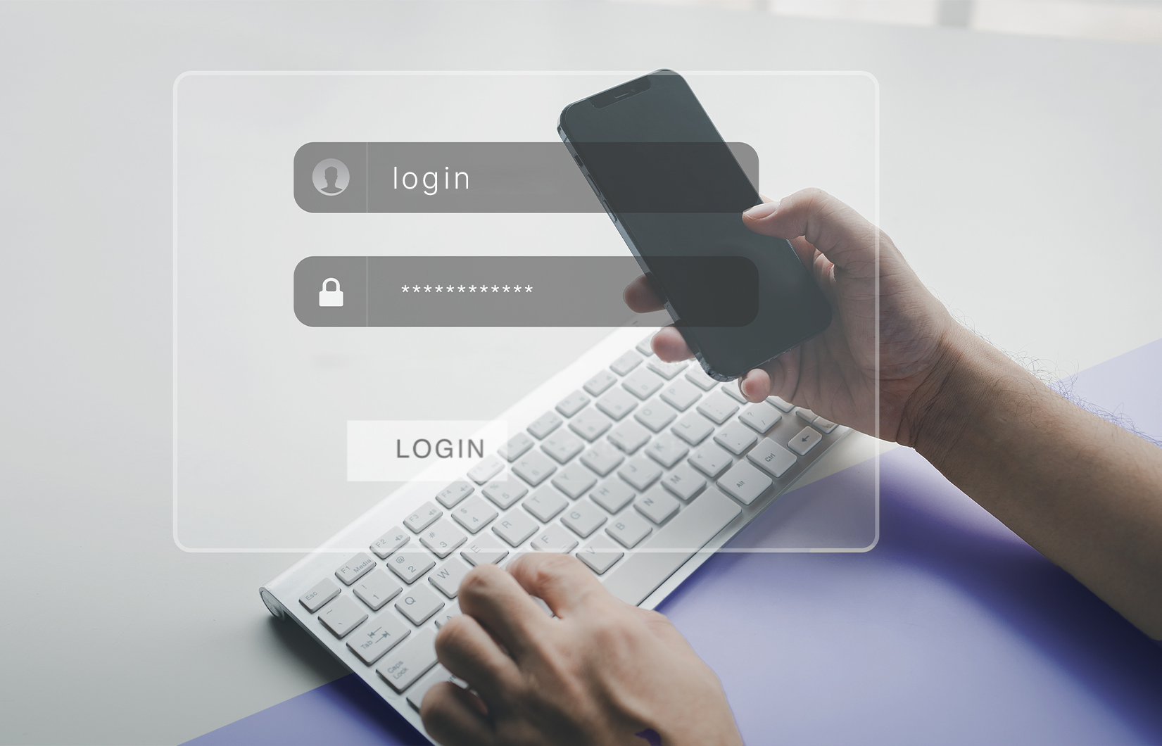 Duas mãos humanas. Uma mexendo num teclado de computador e a outra mexendo num smartphone. Uma tela de login de sistema sobrepondo